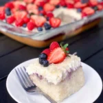Berry Coconut Poke Cake