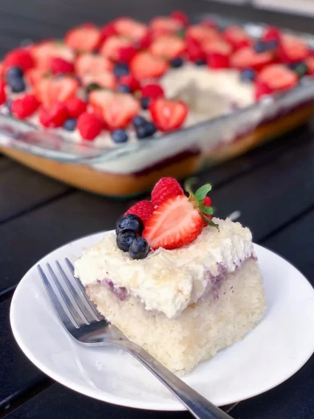 Berry Coconut Poke Cake