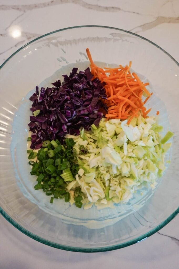 Here’s how to make my favorite Creamy Coleslaw recipe.
